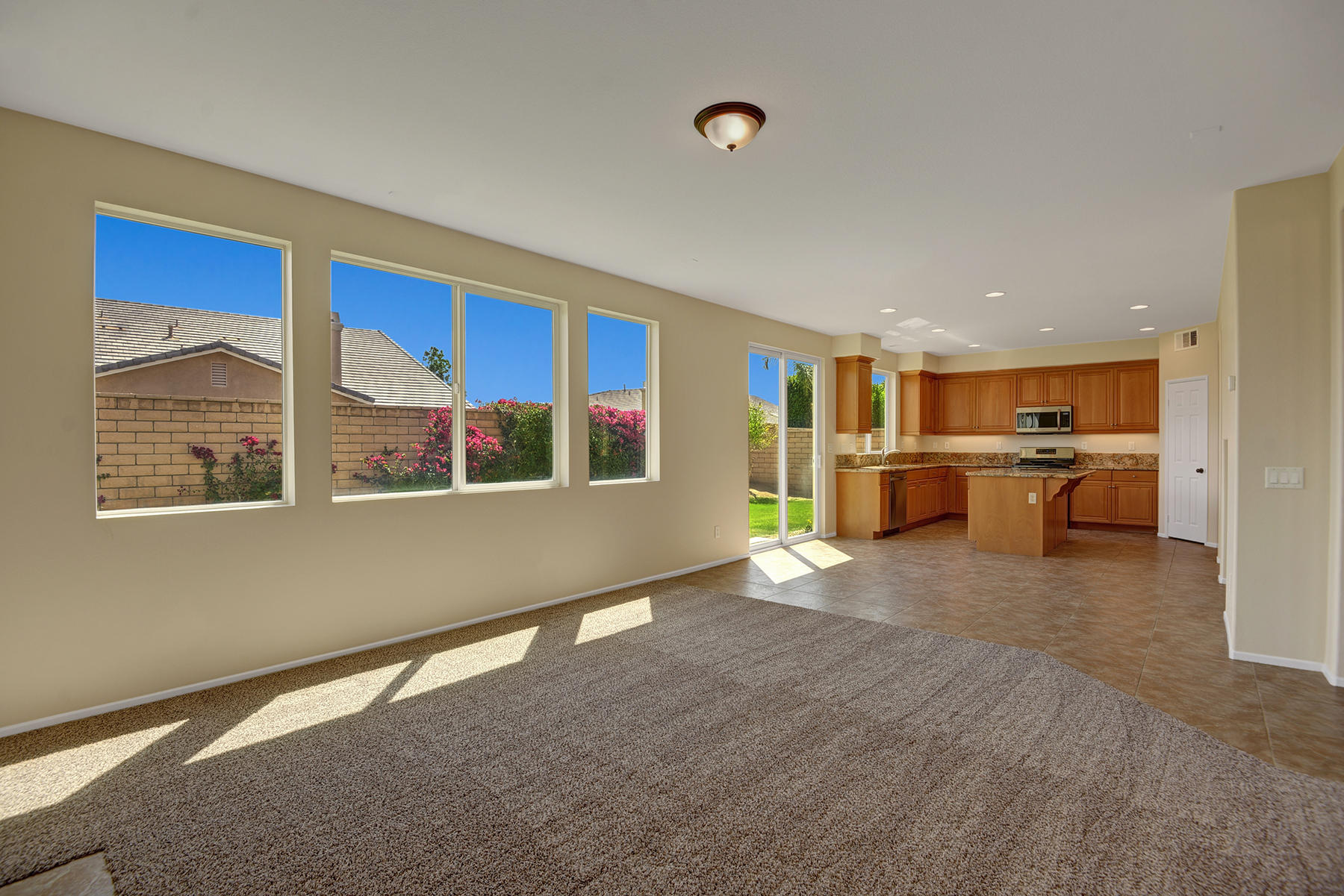 37348 Blackburn Road Indio, CA 92203 - Photo 7 of 30 a view of an empty room with a window