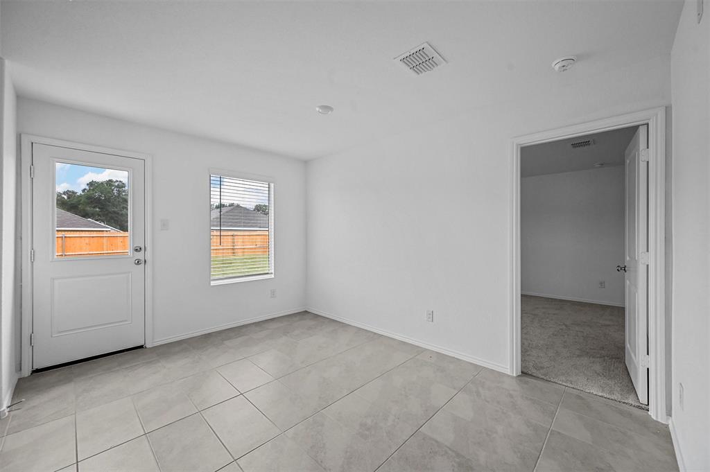 1737 Overall Lane Dallas, TX 75253 - Photo 12 of 21 a view of an empty room with window and closet area