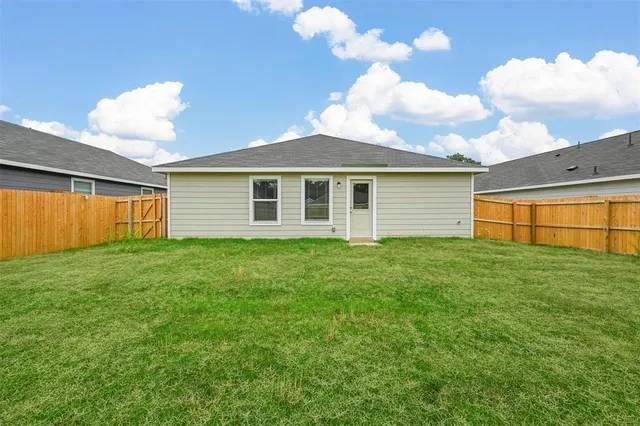 a front view of house with yard
