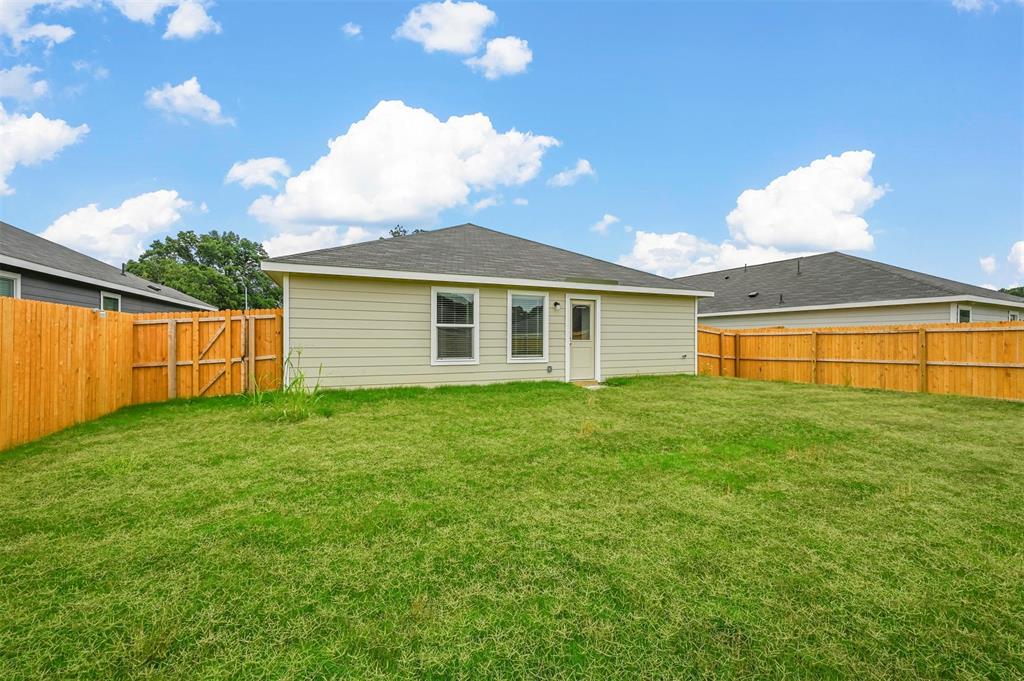 1737 Overall Lane Dallas, TX 75253 - Photo 20 of 21 a view of a house with a backyard