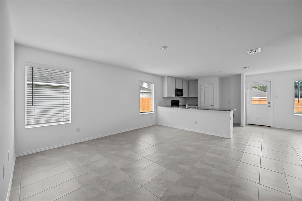 1737 Overall Lane Dallas, TX 75253 - Photo 8 of 21 a view of a kitchen with furniture and window
