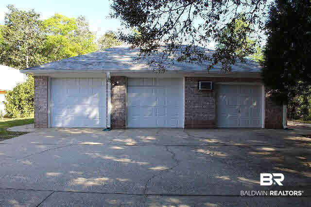 9651 Perdido Vista Drive Elberta, AL 36530 - Photo 3 of 39 Double Garage and workshop, individual doors