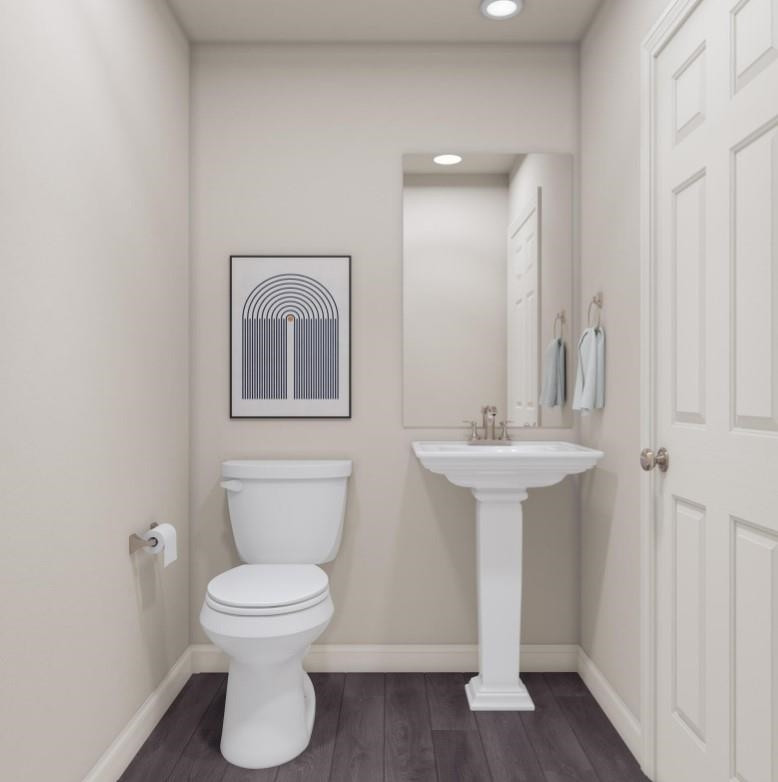 160 Keith Place Roxboro, NC 27573 - Photo 4 of 7 a bathroom with a toilet sink and mirror