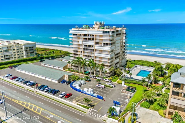 a large building with a city view