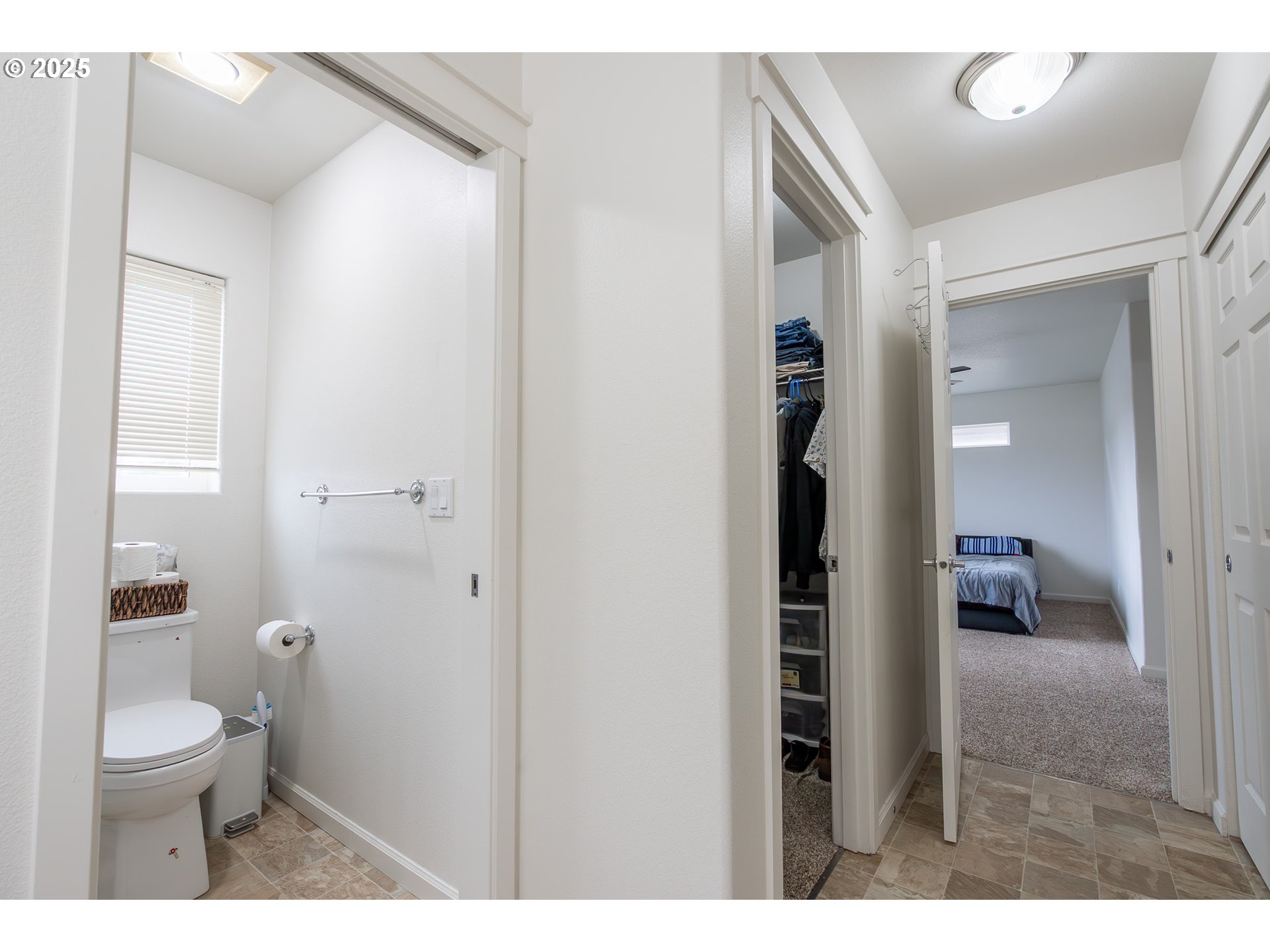 621 Jasmine Circle Independence, OR 97351 - Photo 20 of 29 a bathroom with a toilet a sink and mirror