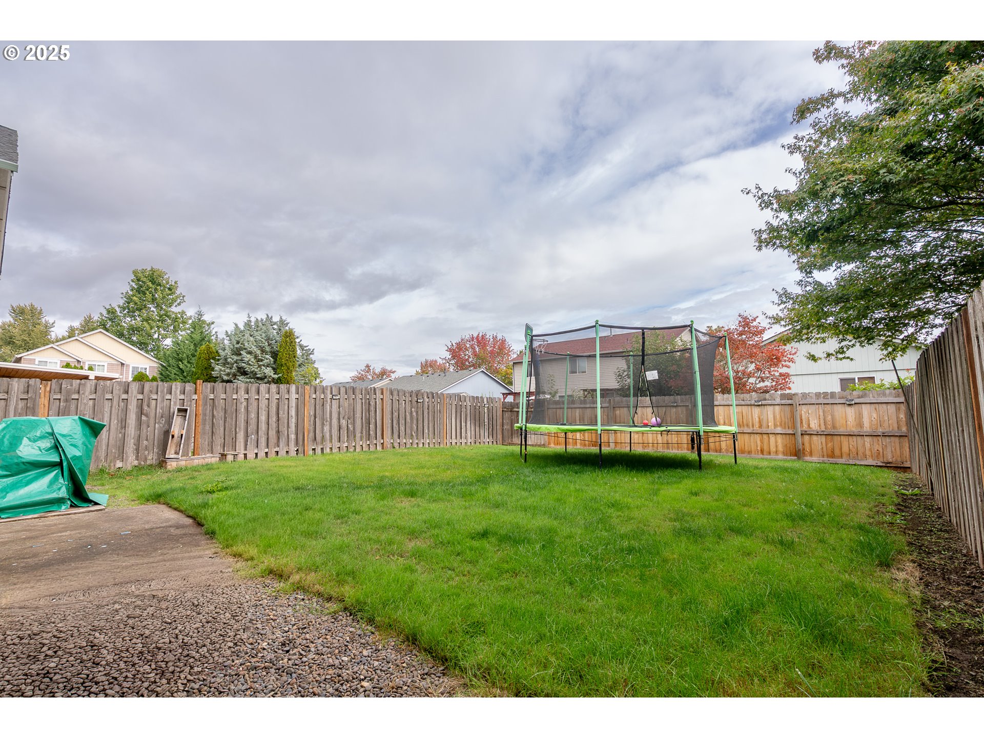621 Jasmine Circle Independence, OR 97351 - Photo 26 of 29 a backyard of a house with lots of green space