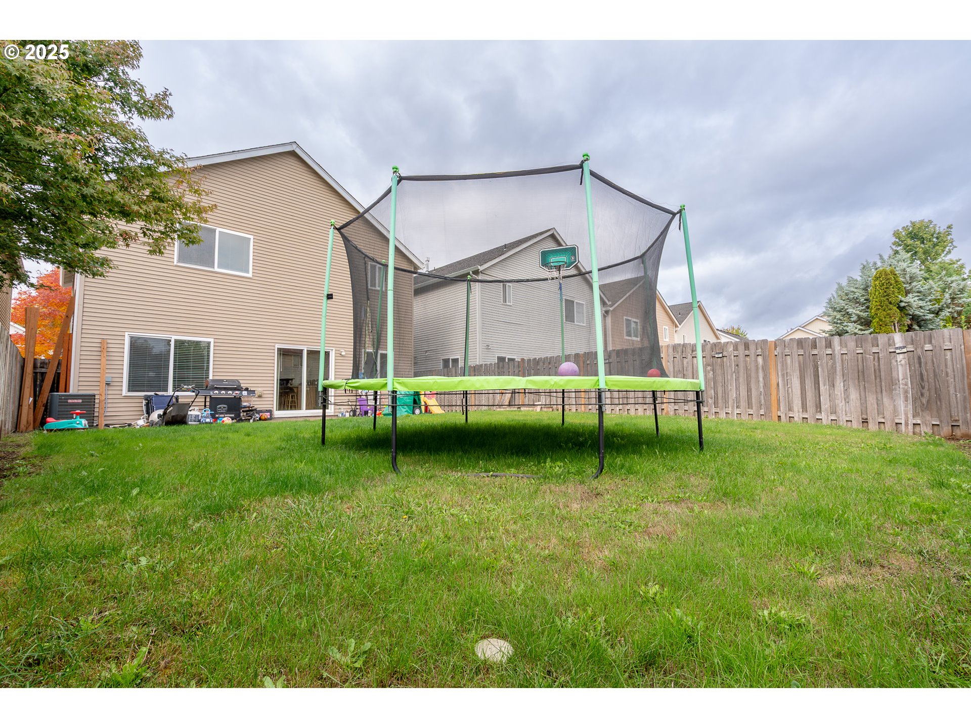621 Jasmine Circle Independence, OR 97351 - Photo 28 of 29 a view of a house with a backyard