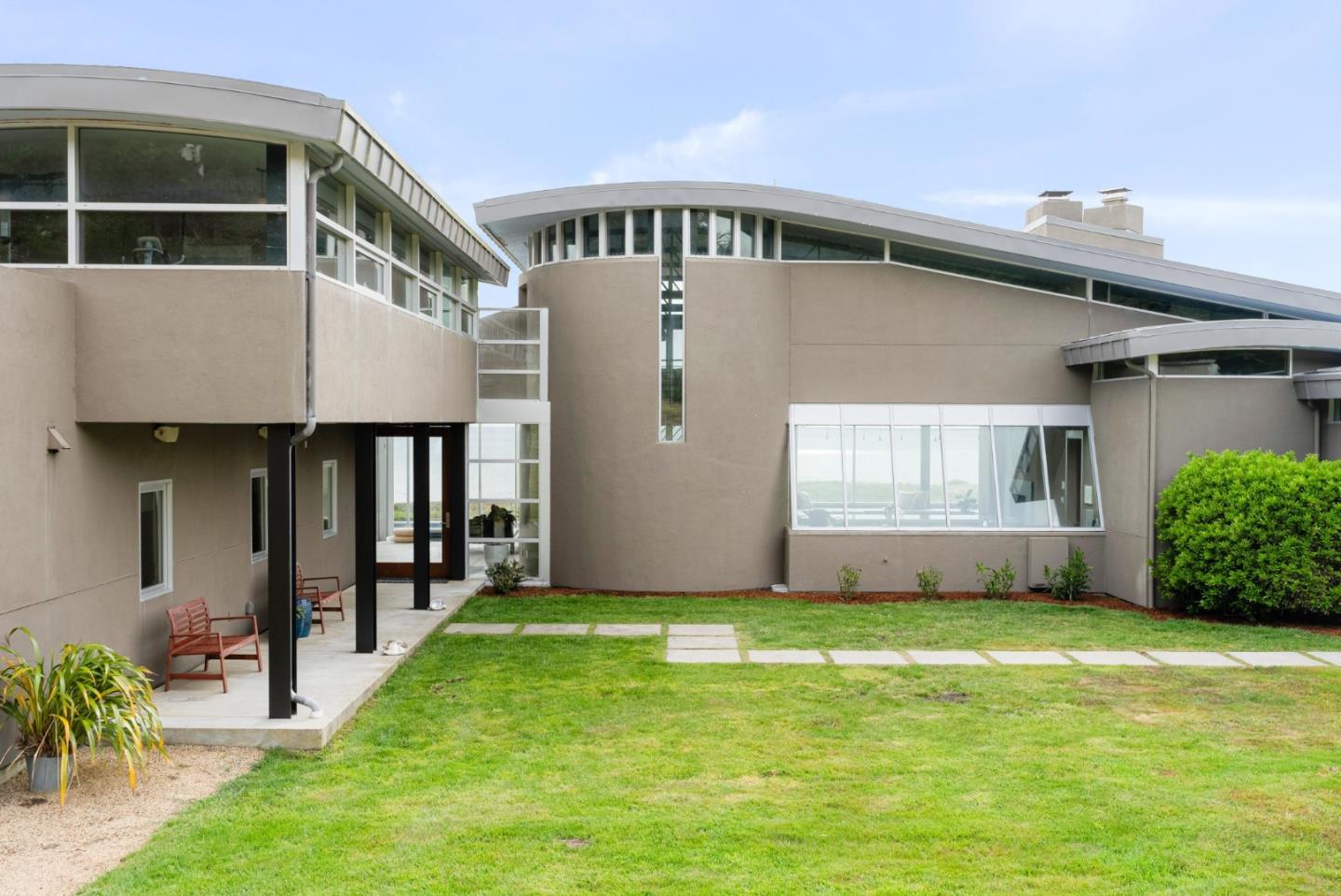 801 Bean Hollow Road Pescadero, CA 94060 - Photo 4 of 70 a front view of a house with a yard