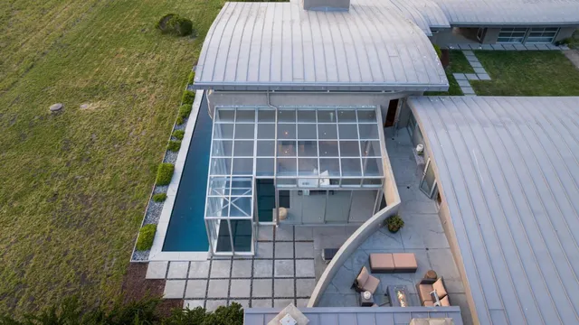 a street sign that is sitting on a wall