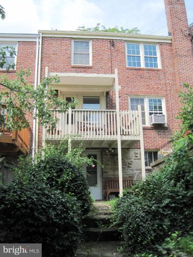 3711 Delverne Road Baltimore, MD 21218 - Photo 1 of 20 a front view of a house with plants and entryway
