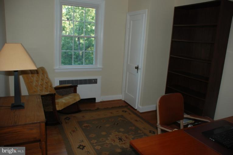 3711 Delverne Road Baltimore, MD 21218 - Photo 14 of 20 a workspace with furniture and a window