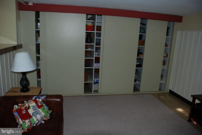 3711 Delverne Road Baltimore, MD 21218 - Photo 19 of 20 a view of room with shelves