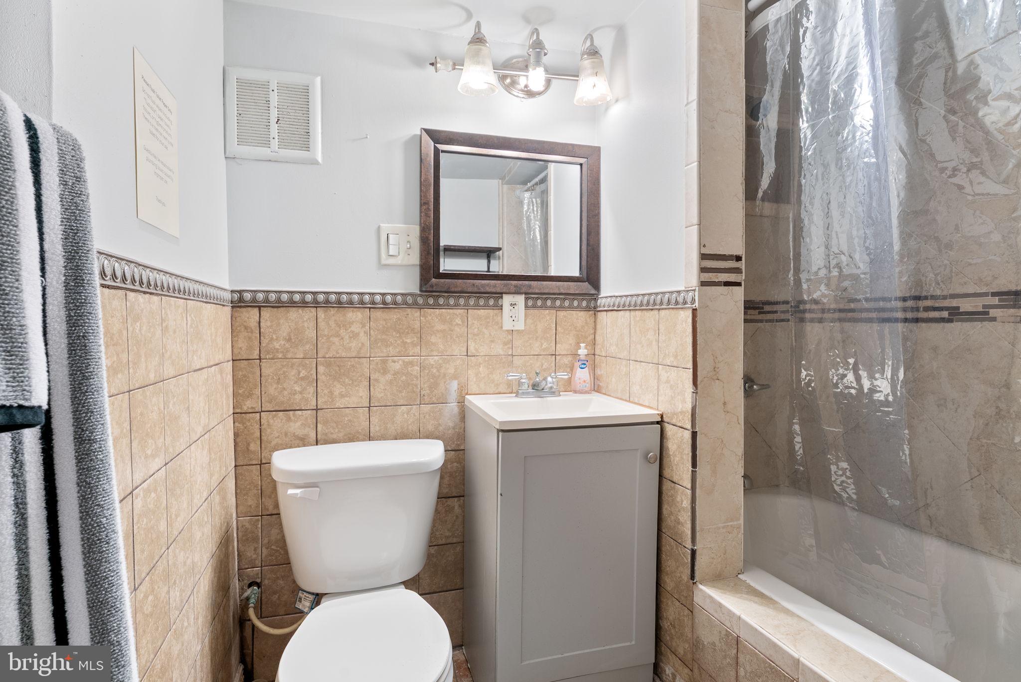 5415 Powhatan Road Riverdale, MD 20737 - Photo 16 of 24 Renovated 2nd full bath in basement
