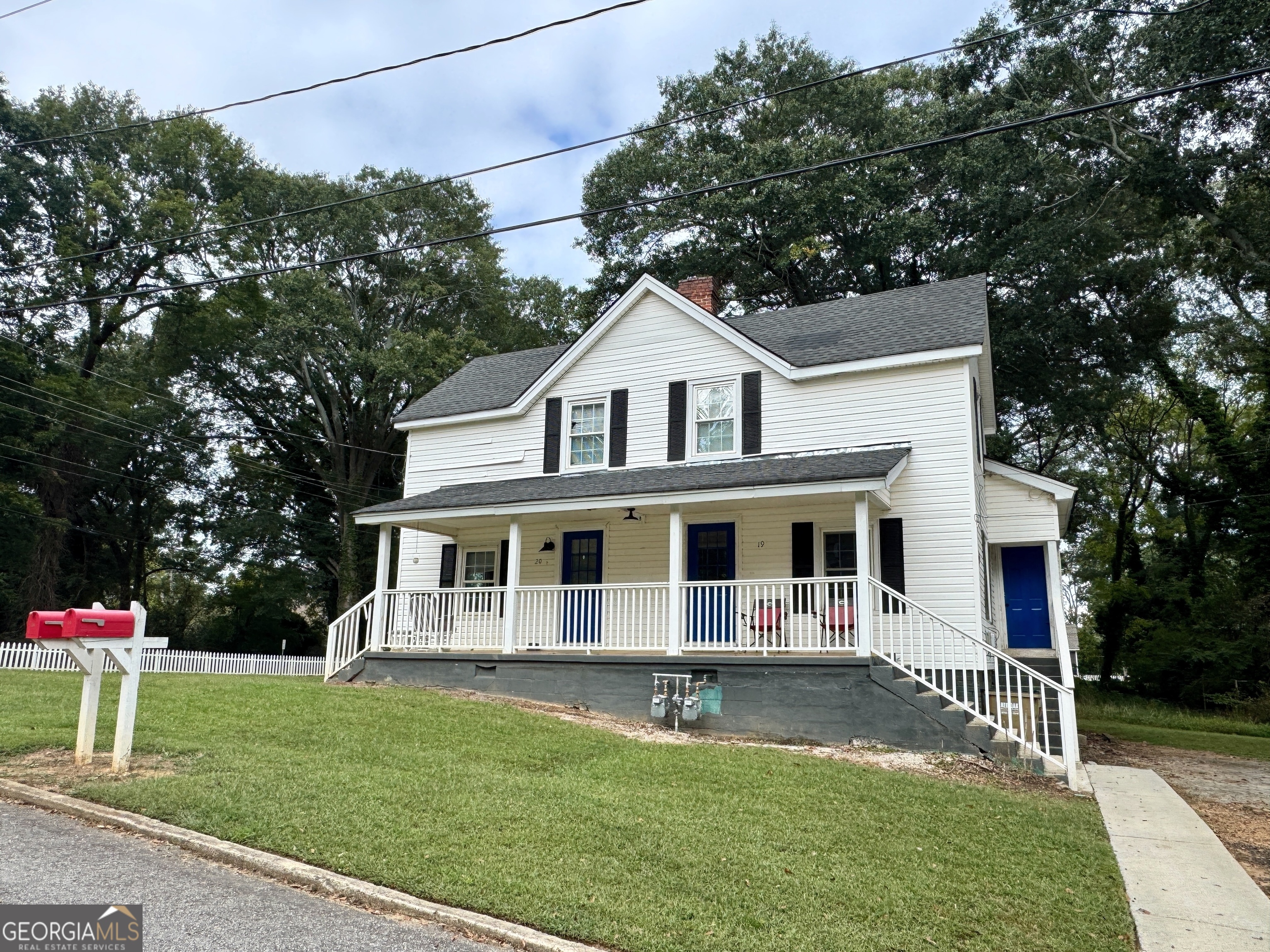 19 Carolina Street Gainesville, GA 30501 - Photo 2 of 6 a front view of a house with a yard