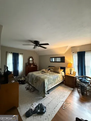 a bedroom with furniture and a couch