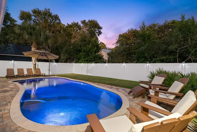 a view of outdoor space swimming pool and furniture
