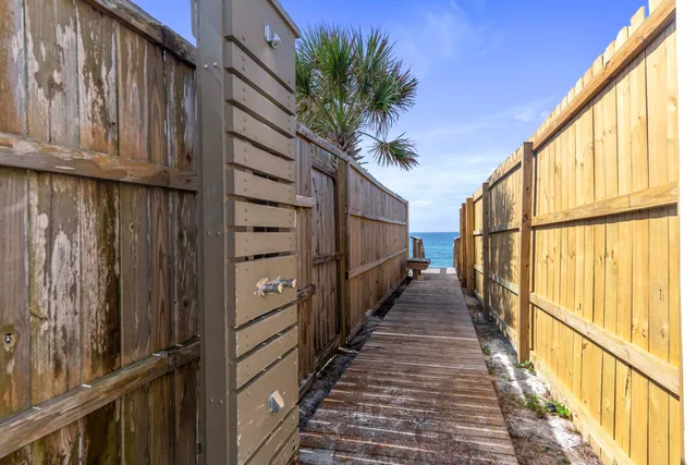 a view of a house with wooden stairs