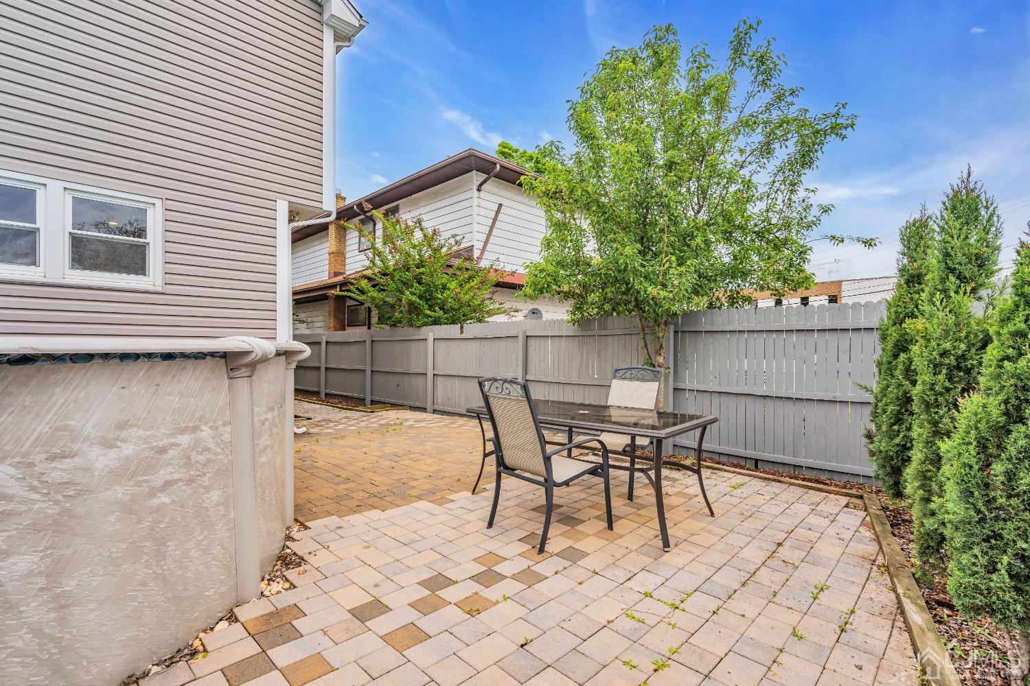 299 Fulton Street Middlesex, NJ 08846 - Photo 37 of 37 a lawn chairs sitting in a backyard