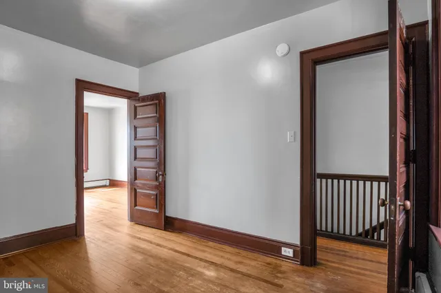 a bathroom with a sink a mirror and shower