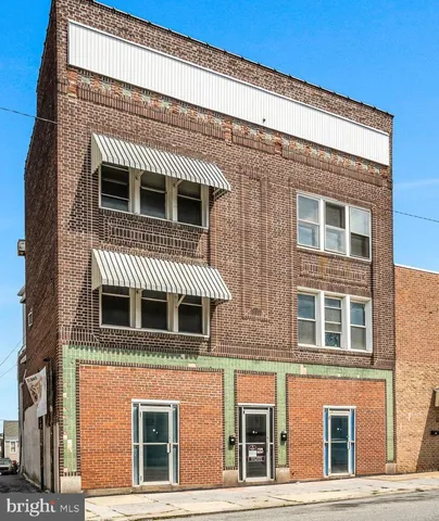 a front view of a house with balcony