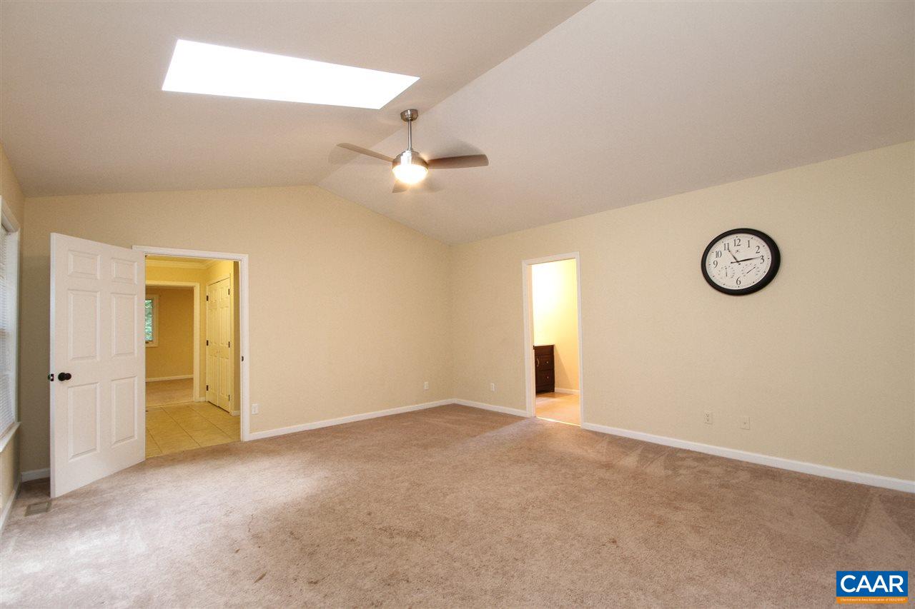 114 Riverside Drive Palmyra, VA 22963 - Photo 20 of 31 an empty room with a ceiling fan and a window