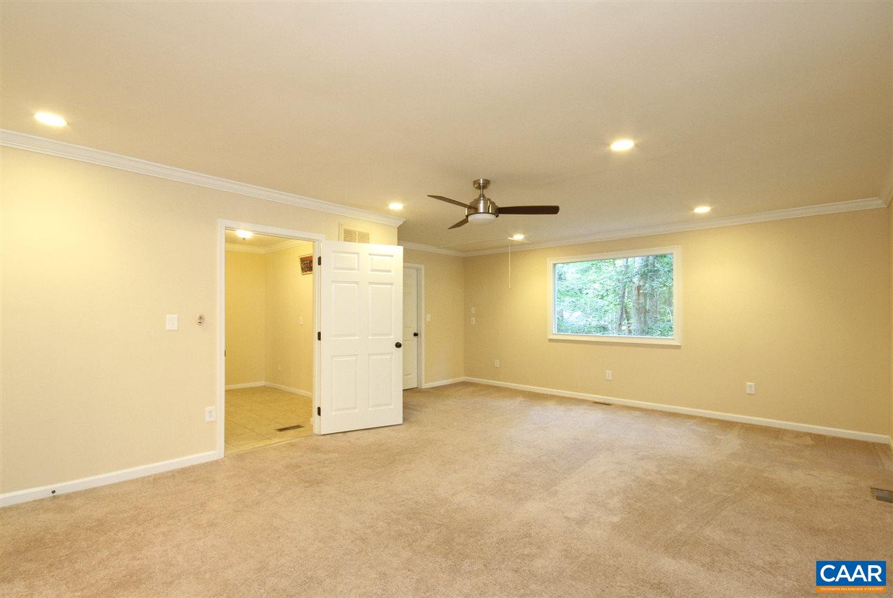114 Riverside Drive Palmyra, VA 22963 - Photo 26 of 31 an empty room with a empty space and windows