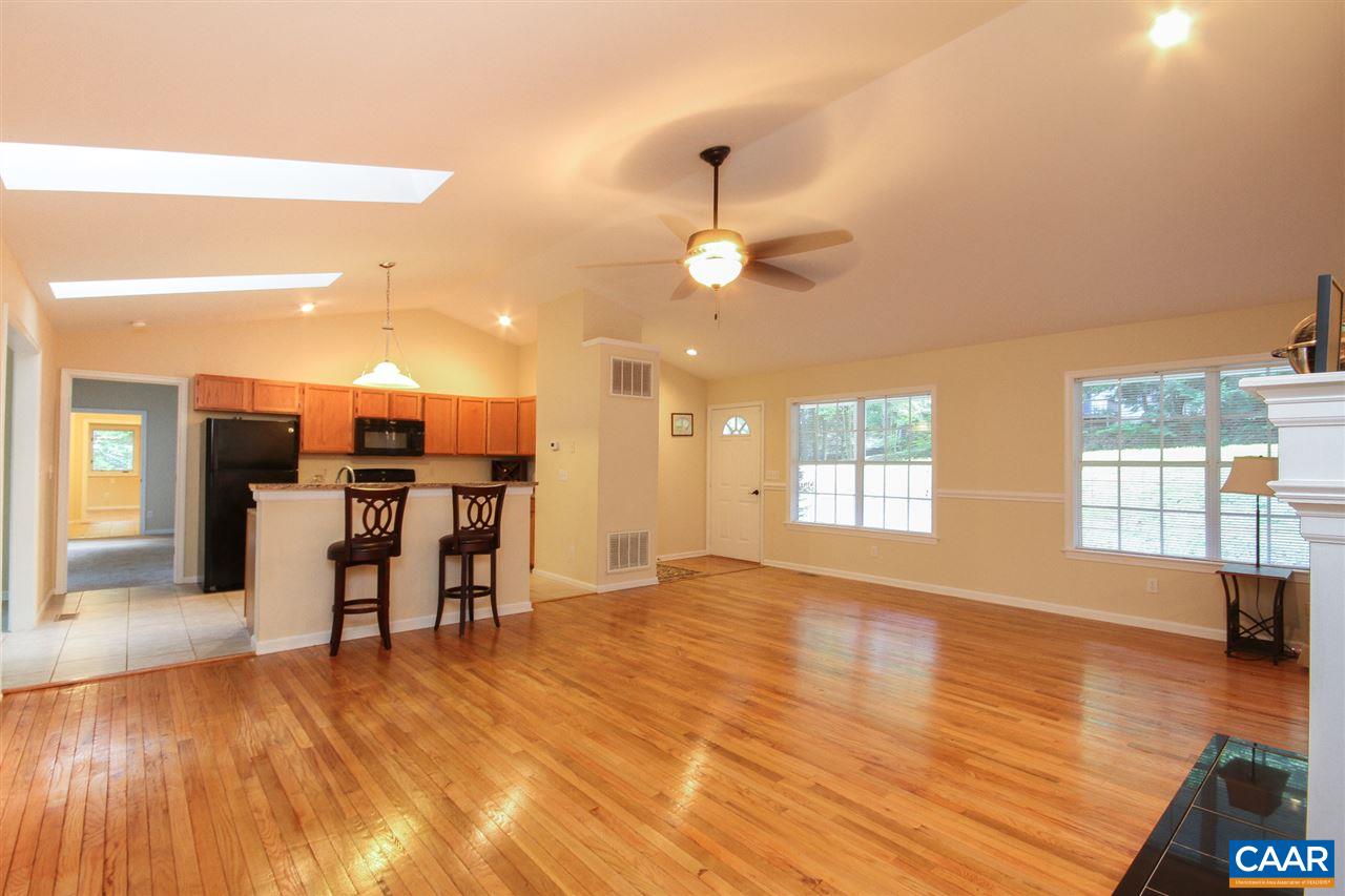 114 Riverside Drive Palmyra, VA 22963 - Photo 3 of 31 a view of a livingroom with furniture hardwood floor and a large window