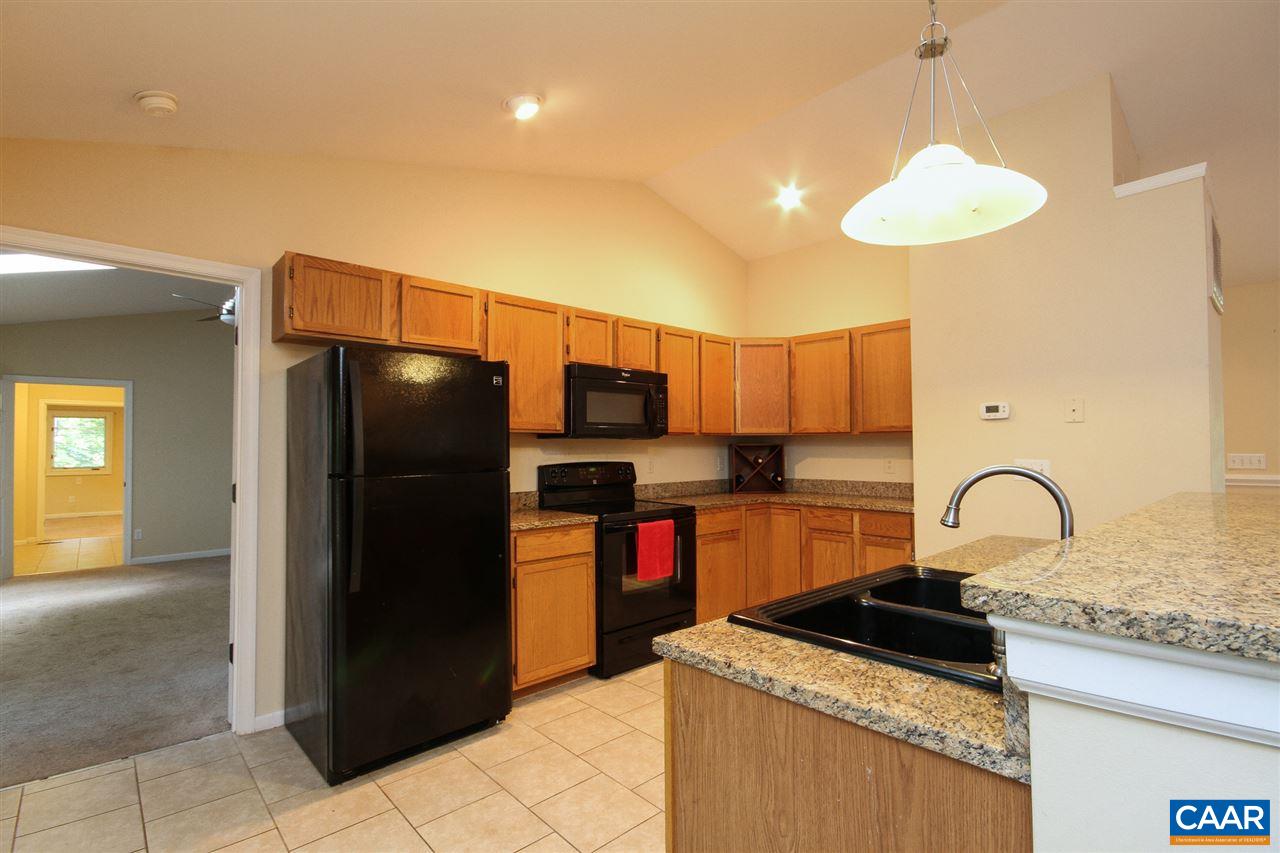 114 Riverside Drive Palmyra, VA 22963 - Photo 6 of 31 a kitchen with stainless steel appliances granite countertop a refrigerator and a stove top oven