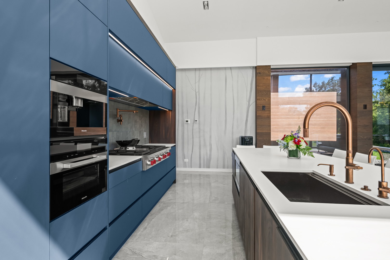 711 Becker Road Glenview, IL 60025 - Photo 32 of 85 a kitchen with stainless steel appliances granite countertop a sink and a stove