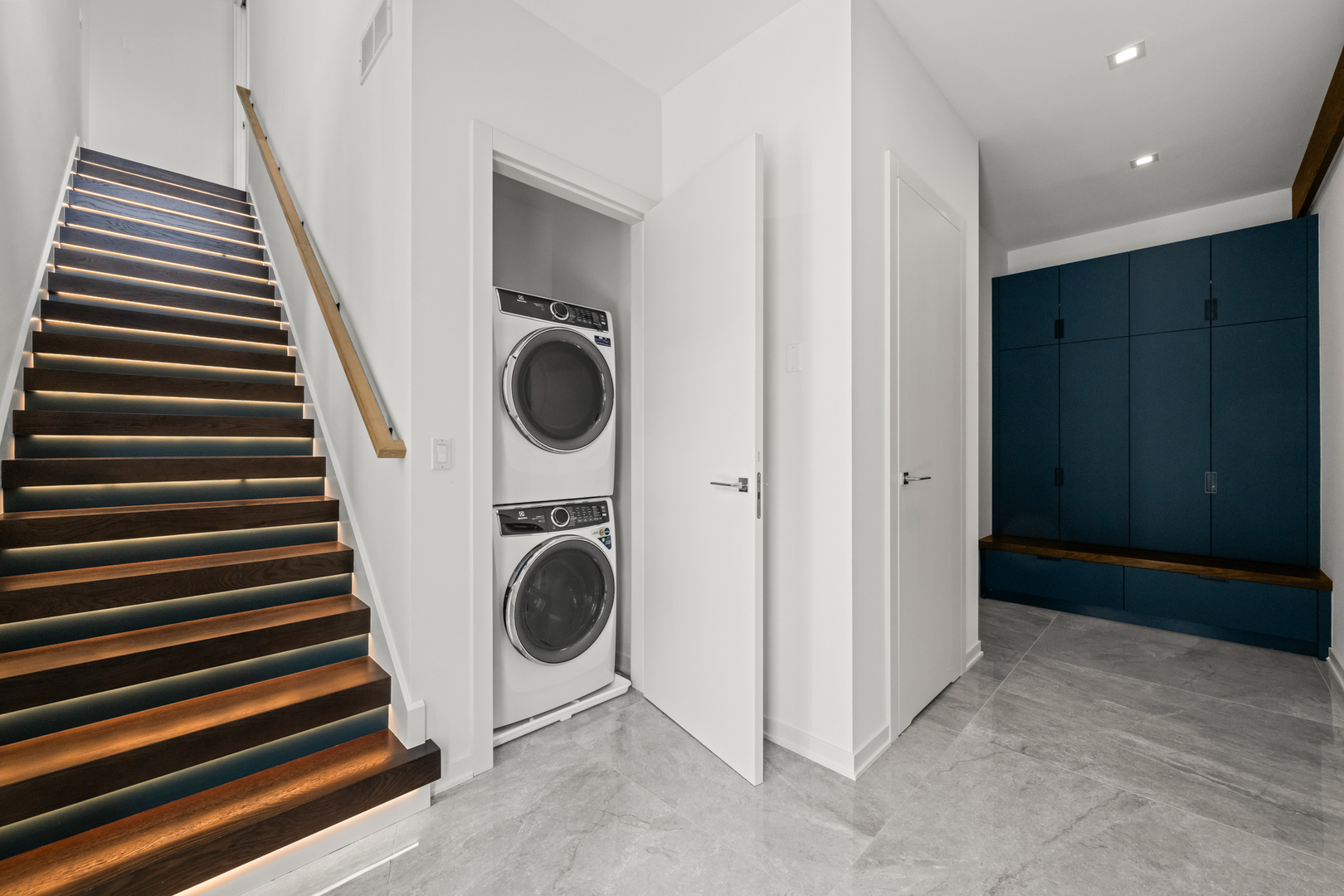 711 Becker Road Glenview, IL 60025 - Photo 41 of 85 a view of a hallway with washer and dryer