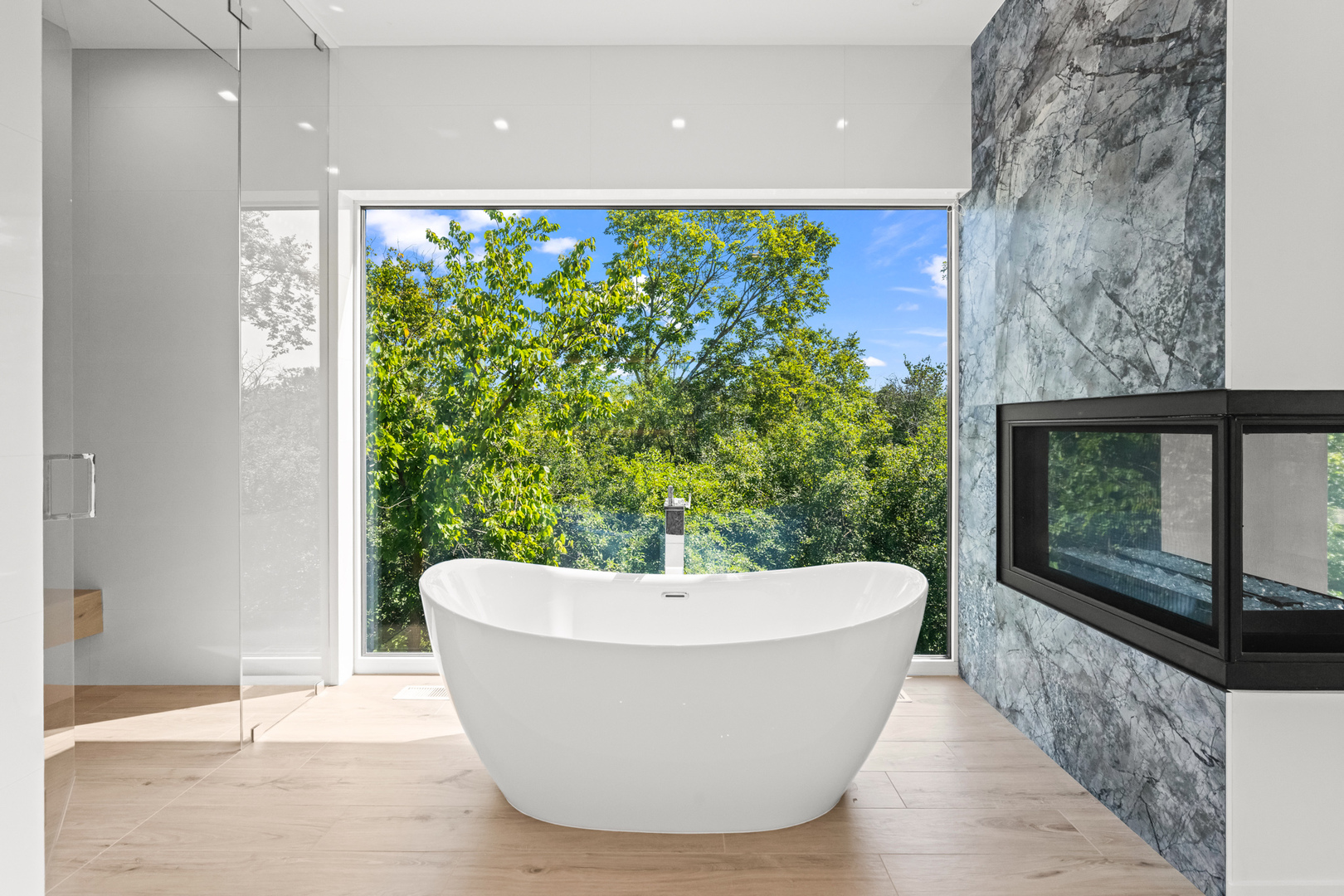 711 Becker Road Glenview, IL 60025 - Photo 46 of 85 a white bath tub sitting in a bathroom