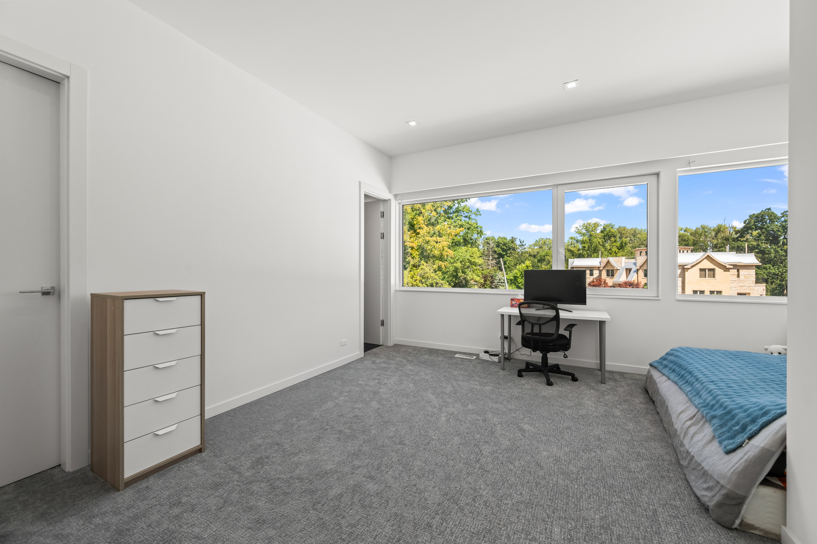 711 Becker Road Glenview, IL 60025 - Photo 60 of 85 a living room with furniture and a floor to ceiling window