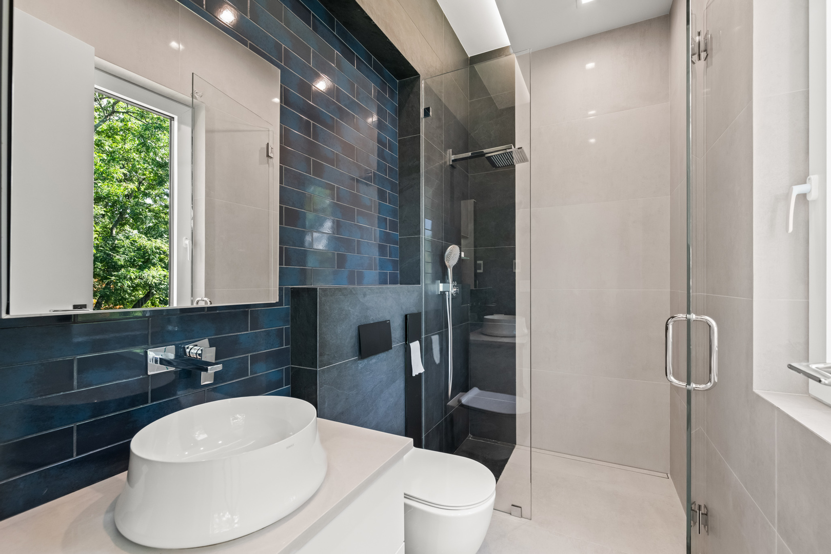 711 Becker Road Glenview, IL 60025 - Photo 72 of 85 a bathroom with a sink a toilet and shower