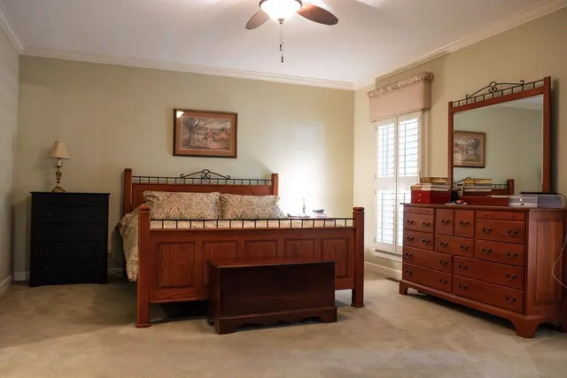 a bathroom with bathtub and window