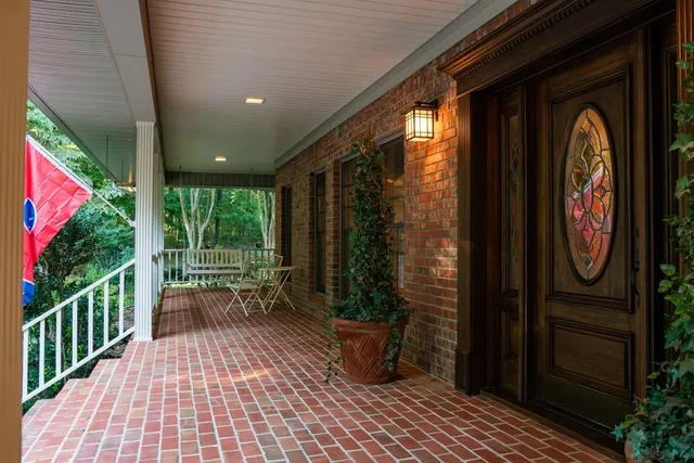 a house view with a garden space