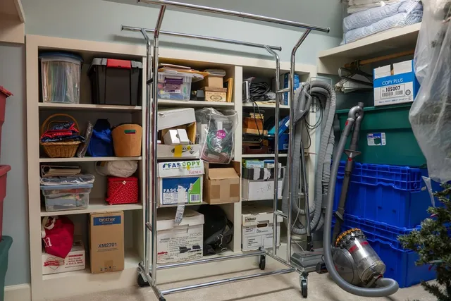 a aerial view of a house with a yard and garden