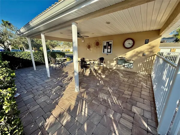 a view of a porch with furniture