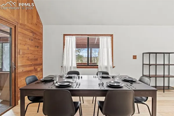a room with furniture and a large window