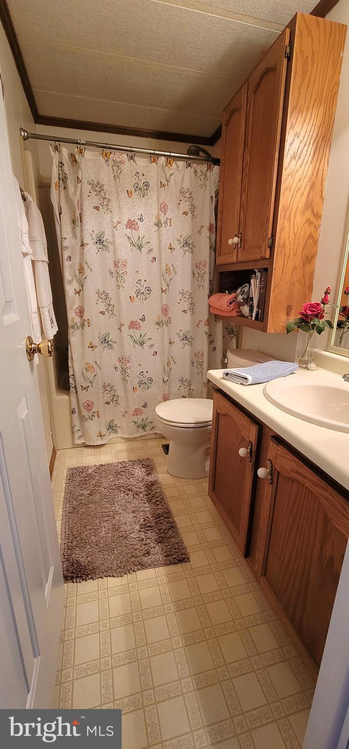 330 John Alden Drive Buena, NJ 08310 - Photo 8 of 16 a bathroom with a sink a toilet and shower