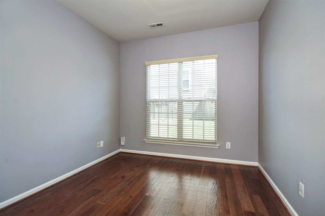 7444 Lagrange Drive Raleigh, NC 27613 - Photo 13 of 30 Private office has French doors and fresh paint. Muted paint colors to decorate as you wish. Office