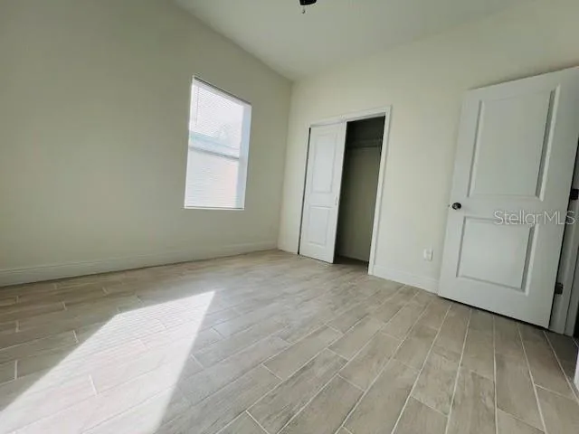 an empty room with windows