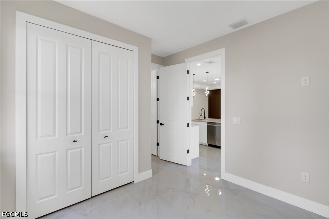 507 Trinity Street East Lehigh Acres, FL 33974 - Photo 26 of 50 a view of an empty room
