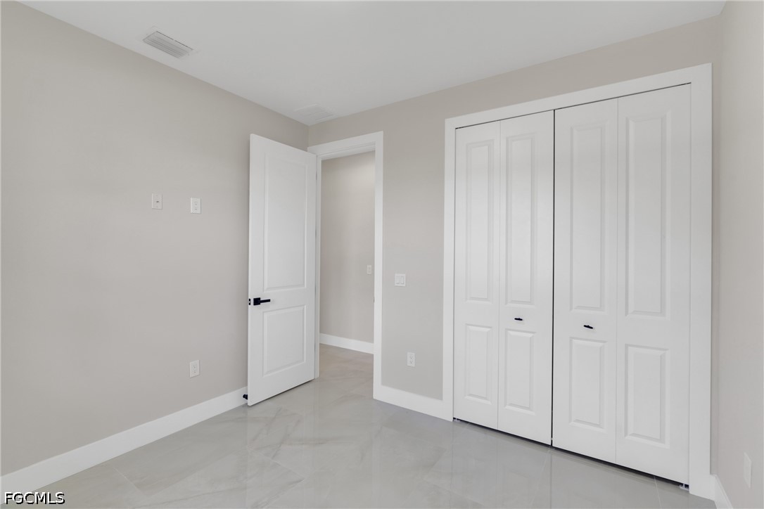 507 Trinity Street East Lehigh Acres, FL 33974 - Photo 33 of 50 a view of an empty room