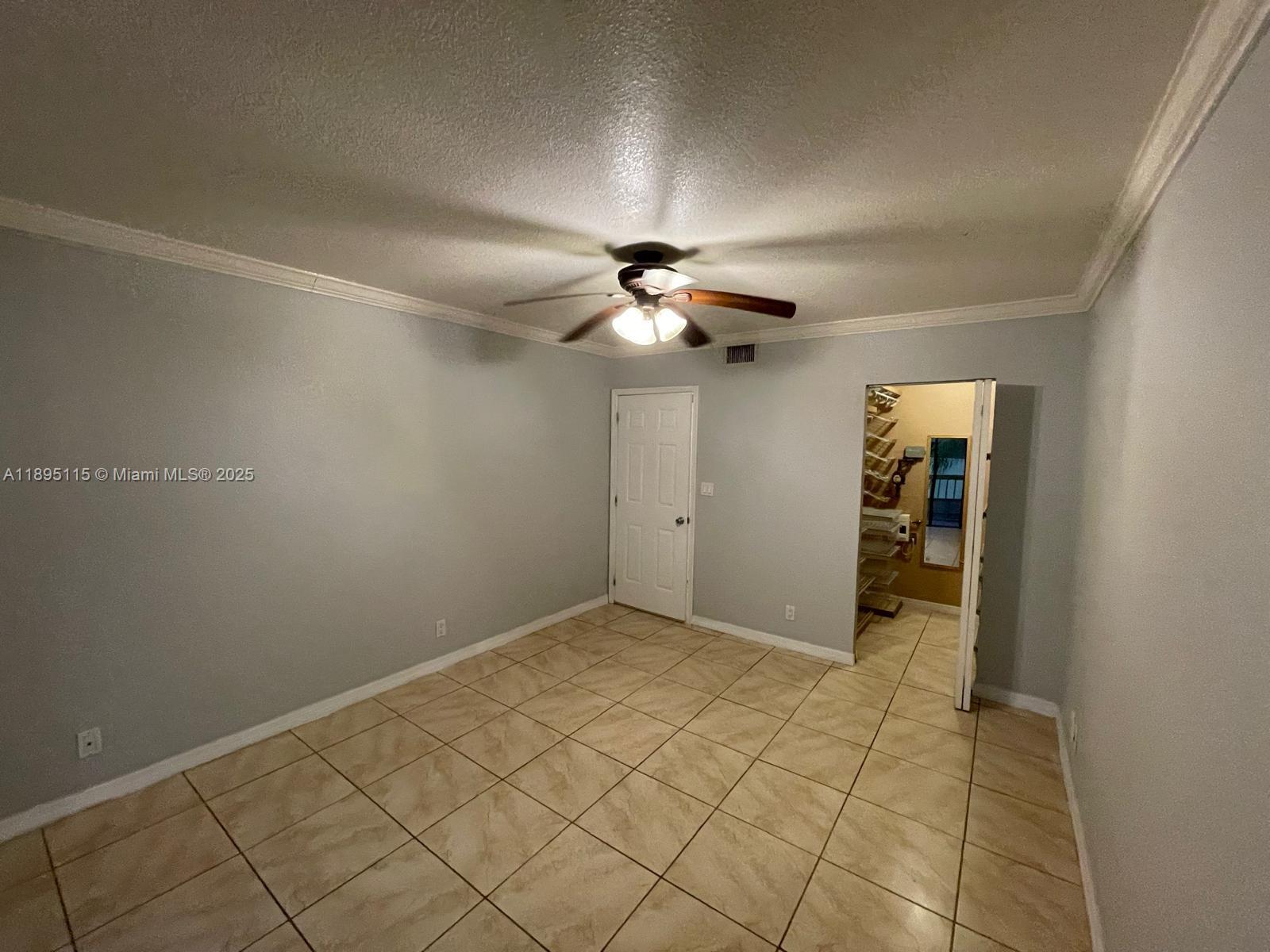 8100 Geneva Court, Unit 440 Doral, FL 33166 - Photo 6 of 11 a view of an empty room