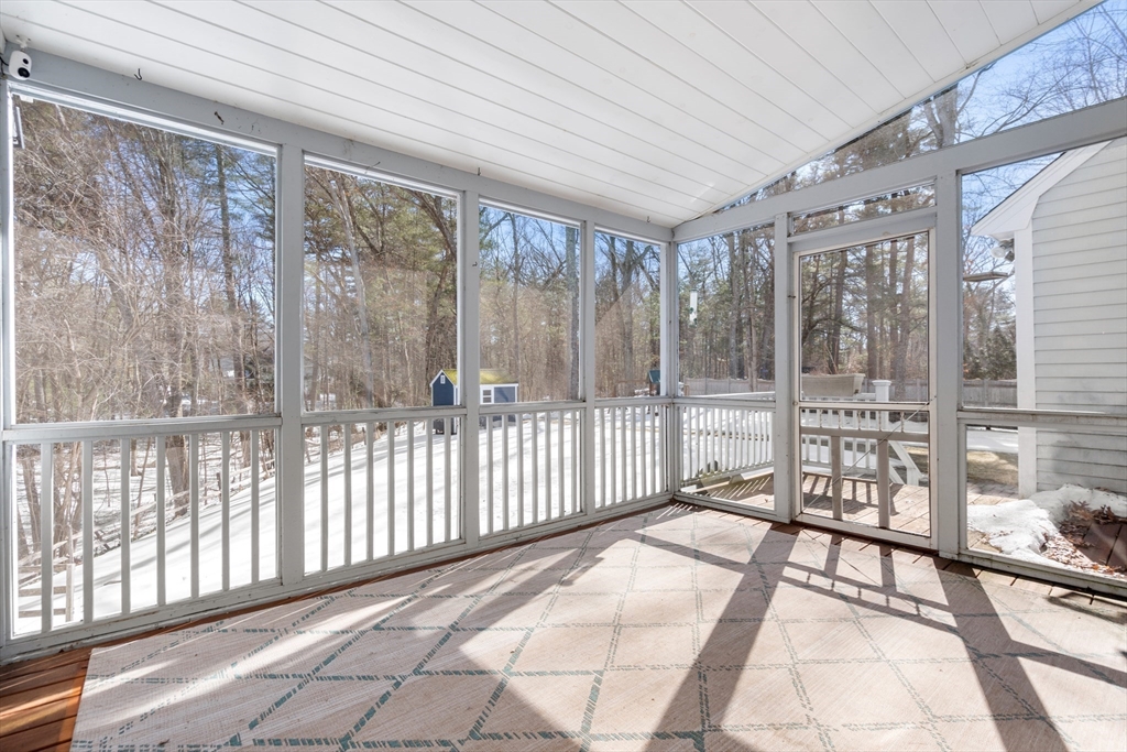370 Peakham Road Sudbury, MA 01776 - Photo 21 of 41 a view of a porch with wooden floor