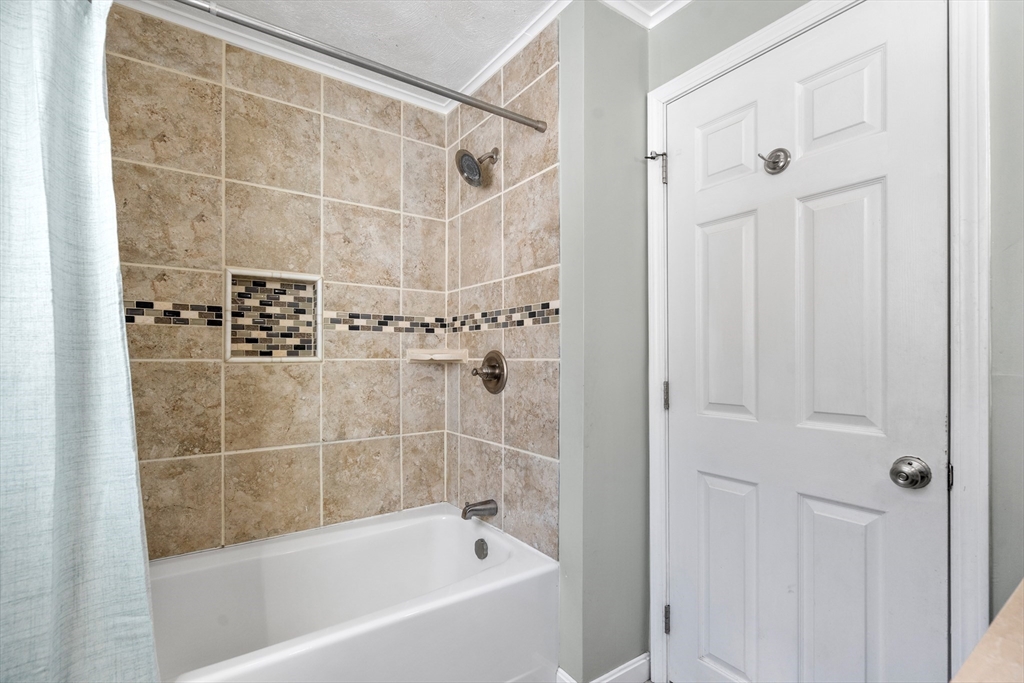 370 Peakham Road Sudbury, MA 01776 - Photo 26 of 41 a bathroom with a bathtub