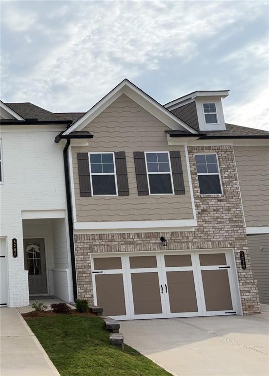 5290 Fox Den Road Oakwood, GA 30566 - Photo 1 of 1 a front view of a house with yard