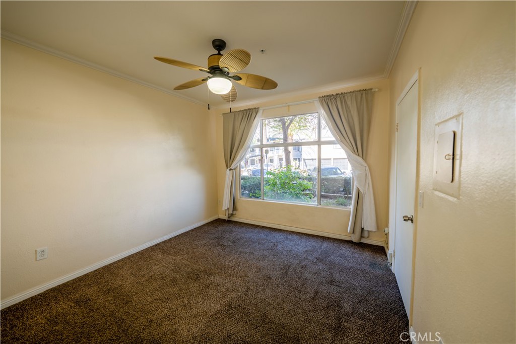 640 West 4th Street, Unit 101 Long Beach, CA 90802 - Photo 14 of 25 an empty room with windows and outdoor view