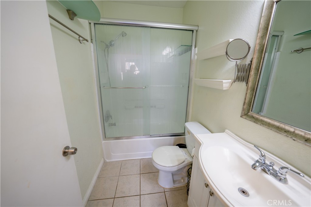 640 West 4th Street, Unit 101 Long Beach, CA 90802 - Photo 17 of 25 a bathroom with a sink toilet and shower