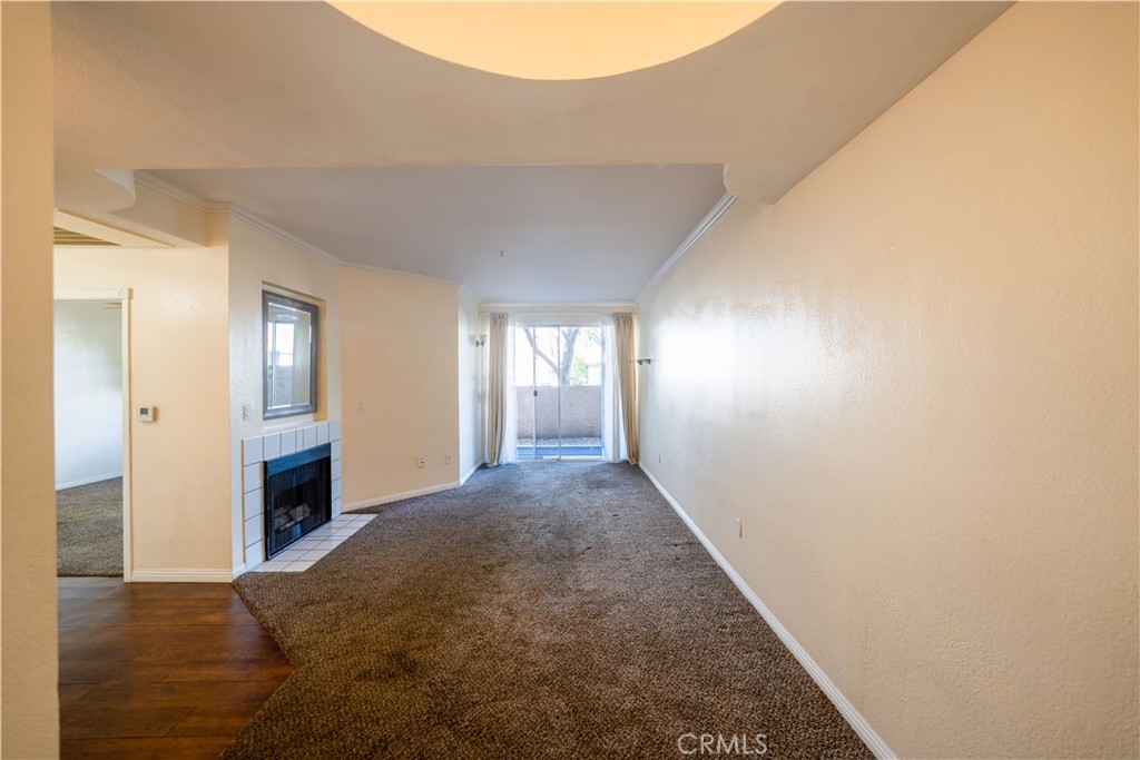 640 West 4th Street, Unit 101 Long Beach, CA 90802 - Photo 9 of 25 a view of entryway and hall with wooden floor